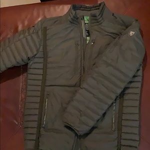 Light olive green Kuhl puffer jacket